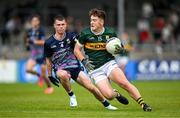 22 June 2025; Ben Kelleher of Kerry in action against Cahair Tighe of Mayo during the Electric Ireland GAA Football All-Ireland Minor Championship semi-final match between Kerry and Mayo at Zimmer Biomet Páirc Chíosóg in Ennis, Clare. Photo by Brendan Moran/Sportsfile