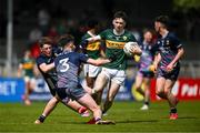 22 June 2025; David Sargent of Kerry in action against Barry Langan of Mayo during the Electric Ireland GAA Football All-Ireland Minor Championship semi-final match between Kerry and Mayo at Zimmer Biomet Páirc Chíosóg in Ennis, Clare. Photo by Brendan Moran/Sportsfile
