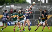 22 June 2025; Adam Kelly of Mayo and Maidhc Ó Sé, 8, and John Curtin of Kerry contest a kickout during the Electric Ireland GAA Football All-Ireland Minor Championship semi-final match between Kerry and Mayo at Zimmer Biomet Páirc Chíosóg in Ennis, Clare. Photo by Brendan Moran/Sportsfile