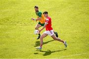 22 June 2025; Craig Lennon of Louth in action against Ryan McHugh of Donegal during the GAA Football All-Ireland Senior Championship preliminary quarter-final match between Donegal and Louth at MacCumhaill Park in Ballybofey, Donegal. Photo by Ramsey Cardy/Sportsfile