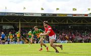 22 June 2025; Dermot Campbell of Louth in action against Finnbarr Roarty of Donegal during the GAA Football All-Ireland Senior Championship preliminary quarter-final match between Donegal and Louth at MacCumhaill Park in Ballybofey, Donegal. Photo by Ramsey Cardy/Sportsfile