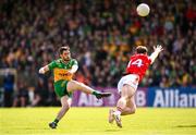 22 June 2025; Ryan McHugh of Donegal in action against Sam Mulroy of Louth during the GAA Football All-Ireland Senior Championship preliminary quarter-final match between Donegal and Louth at MacCumhaill Park in Ballybofey, Donegal. Photo by Ramsey Cardy/Sportsfile