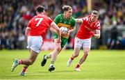 22 June 2025; Ciaran Thompson of Donegal in action against Craig Lennon, left, and Conal McKeever of Louth during the GAA Football All-Ireland Senior Championship preliminary quarter-final match between Donegal and Louth at MacCumhaill Park in Ballybofey, Donegal. Photo by Ramsey Cardy/Sportsfile