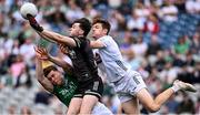 22 June 2025; Fermanagh goalkeeper Sean McNally, supported by team-mate Ronan McCaffrey, left, in action against Kevin Feely of Kildare during the Tailteann Cup semi-final match between Kildare and Fermanagh at Croke Park in Dublin. Photo by Piaras Ó Mídheach/Sportsfile