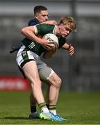 22 June 2025; John Curtin of Kerry is tackled by Rhys Neary of Mayo during the Electric Ireland GAA Football All-Ireland Minor Championship semi-final match between Kerry and Mayo at Zimmer Biomet Páirc Chíosóg in Ennis, Clare. Photo by Brendan Moran/Sportsfile