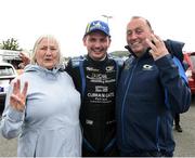 22 June 2025; Callum Devine with his mother and father Deirdre and Seamus after winning the Donegal International Rally in his Skoda Fabia RS during day three of the Wilton Recycling Donegal International Rally at Letterkenny in Donegal. Photo by Philip Fitzpatrick/Sportsfile