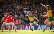 22 June 2025; Ciaran Thompson of Donegal shoots to score his side's second goal during the GAA Football All-Ireland Senior Championship preliminary quarter-final match between Donegal and Louth at MacCumhaill Park in Ballybofey, Donegal. Photo by Ramsey Cardy/Sportsfile