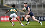 22 June 2025; Cian May of Mayo in action against Alex Tuohy of Kerry during the Electric Ireland GAA Football All-Ireland Minor Championship semi-final match between Kerry and Mayo at Zimmer Biomet Páirc Chíosóg in Ennis, Clare. Photo by Brendan Moran/Sportsfile