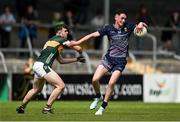 22 June 2025; Conor Jordan of Mayo is tackled by Ronan Sheridan of Kerry during the Electric Ireland GAA Football All-Ireland Minor Championship semi-final match between Kerry and Mayo at Zimmer Biomet Páirc Chíosóg in Ennis, Clare. Photo by Brendan Moran/Sportsfile