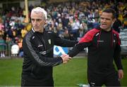 22 June 2025; Donegal manager Jim McGuinness, left, shakes hands with Louth manager Ger Brennan after the GAA Football All-Ireland Senior Championship preliminary quarter-final match between Donegal and Louth at MacCumhaill Park in Ballybofey, Donegal. Photo by Ramsey Cardy/Sportsfile