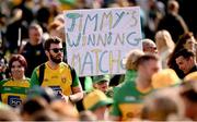 22 June 2025; A Donegal supporter holds a 'Jimmys winning matches' sign after the GAA Football All-Ireland Senior Championship preliminary quarter-final match between Donegal and Louth at MacCumhaill Park in Ballybofey, Donegal. Photo by Ramsey Cardy/Sportsfile