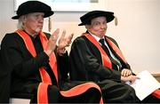 23 June 2025; Irish sports broadcaster Marty Morrissey, right, and singer Johnny Logan, formally known as Sean Patrick Sherrard, as they receive their honorary doctorial awards at the Longford International College Graduation Ceremony 2025 at the Radisson Blu Dublin Airport Hotel in Dublin. Photo by Shauna Clinton/Sportsfile