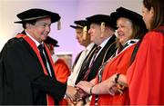 23 June 2025; Irish sports broadcaster Marty Morrissey, left, as he receives his honorary doctorial award at the Longford International College Graduation Ceremony 2025 at the Radisson Blu Dublin Airport Hotel in Dublin. Photo by Shauna Clinton/Sportsfile