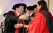 23 June 2025; Irish sports broadcaster Marty Morrissey, left, as he receives his honorary doctorial award at the Longford International College Graduation Ceremony 2025 at the Radisson Blu Dublin Airport Hotel in Dublin. Photo by Shauna Clinton/Sportsfile