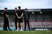 23 June 2025; Bohemians players, including Dayle Rooney, right, before the SSE Airtricity Men's Premier Division match between Bohemians and Shamrock Rovers at Dalymount Park in Dublin. Photo by Shauna Clinton/Sportsfile
