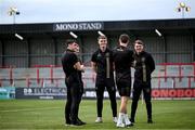 23 June 2025; Bohemians players, including Leigh Kavanagh, centre, walk the pitch before the SSE Airtricity Men's Premier Division match between Bohemians and Shamrock Rovers at Dalymount Park in Dublin. Photo by Shauna Clinton/Sportsfile