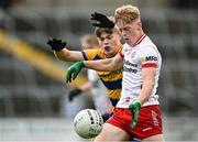 22 June 2025; Peter Coltan of Tyrone in action against Diarmuid O’Higgins of Roscommon during the Electric Ireland GAA Football All-Ireland Minor Championship semi-final match between Tyrone and Roscommon at Kingspan Breffni in Cavan. Photo by Seb Daly/Sportsfile