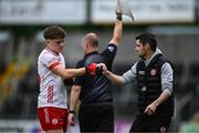 22 June 2025; Tyrone manager Gerard Donnelly and Joel Kerr during the Electric Ireland GAA Football All-Ireland Minor Championship semi-final match between Tyrone and Roscommon at Kingspan Breffni in Cavan. Photo by Seb Daly/Sportsfile