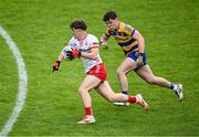 22 June 2025; Joel Kerr of Tyrone in action against Conor Tighe of Roscommon during the Electric Ireland GAA Football All-Ireland Minor Championship semi-final match between Tyrone and Roscommon at Kingspan Breffni in Cavan. Photo by Seb Daly/Sportsfile