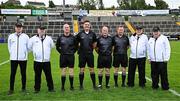 22 June 2025; Referee Chris Maguire and match officials before the Electric Ireland GAA Football All-Ireland Minor Championship semi-final match between Tyrone and Roscommon at Kingspan Breffni in Cavan. Photo by Seb Daly/Sportsfile