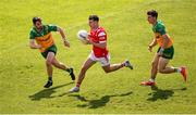 22 June 2025; Craig Lennon of Louth in action against Ryan McHugh, left, and Finnbarr Roarty of Donegal during the GAA Football All-Ireland Senior Championship preliminary quarter-final match between Donegal and Louth at MacCumhaill Park in Ballybofey, Donegal. Photo by Ramsey Cardy/Sportsfile