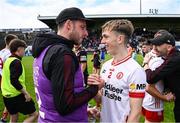 22 June 2025; Elliott Kerr of Tyrone and backroom staff member Niall Morgan after the Electric Ireland GAA Football All-Ireland Minor Championship semi-final match between Tyrone and Roscommon at Kingspan Breffni in Cavan. Photo by Seb Daly/Sportsfile
