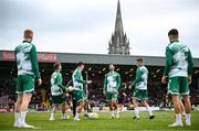 23 June 2025; Shamrock Rovers players, including Danny Mandroiu, centre, warm up before the SSE Airtricity Men's Premier Division match between Bohemians and Shamrock Rovers at Dalymount Park in Dublin. Photo by Shauna Clinton/Sportsfile