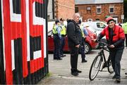 23 June 2025; A Bohemians supporter arrives before the SSE Airtricity Men's Premier Division match between Bohemians and Shamrock Rovers at Dalymount Park in Dublin. Photo by Shauna Clinton/Sportsfile