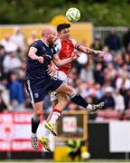 23 June 2025; Liam Boyce of Derry City in action against Joe Redmond of St Patrick's Athletic during the SSE Airtricity Men's Premier Division match between St Patrick's Athletic and Derry City at Richmond Park in Dublin. Photo by Ben McShane/Sportsfile