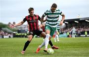 23 June 2025; Lee Grace of Shamrock Rovers in action against Dayle Rooney of Bohemians during the SSE Airtricity Men's Premier Division match between Bohemians and Shamrock Rovers at Dalymount Park in Dublin. Photo by Shauna Clinton/Sportsfile
