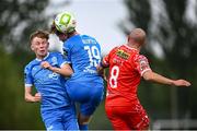 23 June 2025; Waterford's Conan Noonan, left, and Sam Glenfield in action against Mark Coyle of Shelbourne during the SSE Airtricity Men's Premier Division match between Waterford and Shelbourne at the Regional Sports Centre in Waterford. Photo by Piaras Ó Mídheach/Sportsfile