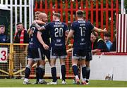 23 June 2025; Liam Boyce of Derry City, left, celebrates with teammates after scoring their side's first goal during the SSE Airtricity Men's Premier Division match between St Patrick's Athletic and Derry City at Richmond Park in Dublin. Photo by Ben McShane/Sportsfile