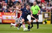 23 June 2025; Gavin Whyte of Derry City in action against Jamie Lennon of St Patrick's Athletic during the SSE Airtricity Men's Premier Division match between St Patrick's Athletic and Derry City at Richmond Park in Dublin. Photo by Ben McShane/Sportsfile