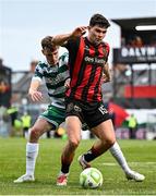23 June 2025; James Clarke of Bohemians in action against Matt Healy of Shamrock Rovers during the SSE Airtricity Men's Premier Division match between Bohemians and Shamrock Rovers at Dalymount Park in Dublin. Photo by Shauna Clinton/Sportsfile