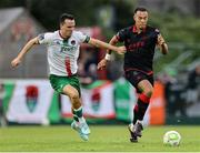 23 June 2025; Aaron Harper-Bailey of Drogheda United in action against Alex Nolan of Cork City during the SSE Airtricity Men's Premier Division match between Cork City and Drogheda United at Turner's Cross in Cork. Photo by Thomas Flinkow/Sportsfile