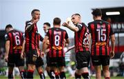 23 June 2025; Ross Tierney of Bohemians, centre, celebrates his side's second goal scored by James Clarke, not pictured, during the SSE Airtricity Men's Premier Division match between Bohemians and Shamrock Rovers at Dalymount Park in Dublin. Photo by Shauna Clinton/Sportsfile
