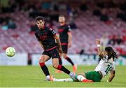 23 June 2025; Luke Heeney of Drogheda United is tackled by Milan Mbeng of Cork City during the SSE Airtricity Men's Premier Division match between Cork City and Drogheda United at Turner's Cross in Cork. Photo by Thomas Flinkow/Sportsfile