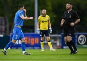 23 June 2025; Pádraig Amond of Waterford shares a joke with referee Declan Toland during the SSE Airtricity Men's Premier Division match between Waterford and Shelbourne at the Regional Sports Centre in Waterford. Photo by Piaras Ó Mídheach/Sportsfile
