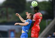 23 June 2025; Mipo Odubeko of Shelbourne in action against Rowan McDonald of Waterford during the SSE Airtricity Men's Premier Division match between Waterford and Shelbourne at the Regional Sports Centre in Waterford. Photo by Piaras Ó Mídheach/Sportsfile