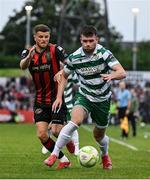 23 June 2025; Josh Honohan of Shamrock Rovers in action against Adam McDonnell of Bohemians during the SSE Airtricity Men's Premier Division match between Bohemians and Shamrock Rovers at Dalymount Park in Dublin. Photo by Shauna Clinton/Sportsfile
