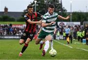 23 June 2025; Josh Honohan of Shamrock Rovers in action against Adam McDonnell of Bohemians during the SSE Airtricity Men's Premier Division match between Bohemians and Shamrock Rovers at Dalymount Park in Dublin. Photo by Shauna Clinton/Sportsfile