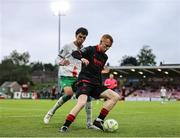 23 June 2025; Shane Farrell of Drogheda United in action against Freddie Anderson of Cork City during the SSE Airtricity Men's Premier Division match between Cork City and Drogheda United at Turner's Cross in Cork. Photo by Thomas Flinkow/Sportsfile