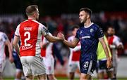 23 June 2025; Robbie Benson of Derry City, right, and Sean Hoare of St Patrick's Athletic after the SSE Airtricity Men's Premier Division match between St Patrick's Athletic and Derry City at Richmond Park in Dublin. Photo by Ben McShane/Sportsfile