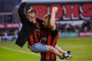 23 June 2025; Ross Tierney of Bohemians celebrates with Cian Hankey after the SSE Airtricity Men's Premier Division match between Bohemians and Shamrock Rovers at Dalymount Park in Dublin. Photo by Ramsey Cardy/Sportsfile