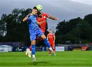 23 June 2025; Tommy Lonergan of Waterford in action against Mark Coyle of Shelbourne during the SSE Airtricity Men's Premier Division match between Waterford and Shelbourne at the Regional Sports Centre in Waterford. Photo by Piaras Ó Mídheach/Sportsfile