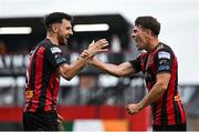 23 June 2025; Dayle Rooney of Bohemians, right, celebrates with teammate Jordan Flores after scoring their side's second goal during the SSE Airtricity Men's Premier Division match between Bohemians and Shamrock Rovers at Dalymount Park in Dublin. Photo by Shauna Clinton/Sportsfile