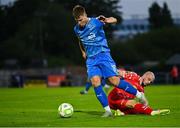 23 June 2025; Tommy Lonergan of Waterford in action against Mark Coyle of Shelbourne during the SSE Airtricity Men's Premier Division match between Waterford and Shelbourne at the Regional Sports Centre in Waterford. Photo by Piaras Ó Mídheach/Sportsfile
