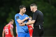 23 June 2025; Pádraig Amond of Waterford with referee Declan Toland during the SSE Airtricity Men's Premier Division match between Waterford and Shelbourne at the Regional Sports Centre in Waterford. Photo by Piaras Ó Mídheach/Sportsfile
