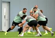 24 June 2025; Jack Aungier, left, with Tom Stewart and Michael Milne during the Ireland rugby squad training at the IRFU High Performance Centre at the Sport Ireland Campus in Dublin. Photo by Brendan Moran/Sportsfile