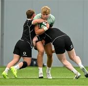 24 June 2025; Hugh Gavin is tackled by Craig Casey during the Ireland rugby squad training at the IRFU High Performance Centre at the Sport Ireland Campus in Dublin. Photo by Brendan Moran/Sportsfile